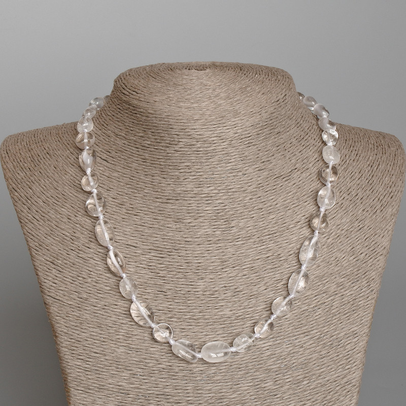 Collier de cristal de roche facetté, diamètre 9×12 mm ±, longueur 48 cm ±