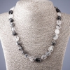 Collier quartz rutile poilu noir, perles plates facettées, diamètre 11×14 mm ±, longueur 50 cm et plus
