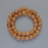 Perles de calcite, billes lisses, diamètre 10 mm ±, longueur 39 cm sur fil