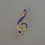 Broche clé de sol bleu émail, métal doré 38×16 mm