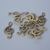 Accessoire : pendentif «clé de sol», diamètre 33×14,5 mm, diamètre d'ouverture 5,5×2 mm, conditionnement : 11 pièces ±, couleur bronze du métal