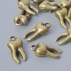 Pendentif «Dent», diamètre 15,5×7,5 mm, diamètre du trou 1,6 mm, conditionnement ± 15 pièces, couleur bronze du métal