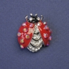 Broche «Coccinelle» avec strass blancs et arc-en-ciel 25×22 mm+