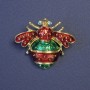 Broche «Insecte» rouge et vert émaillé sur métal doré 32×38 mm