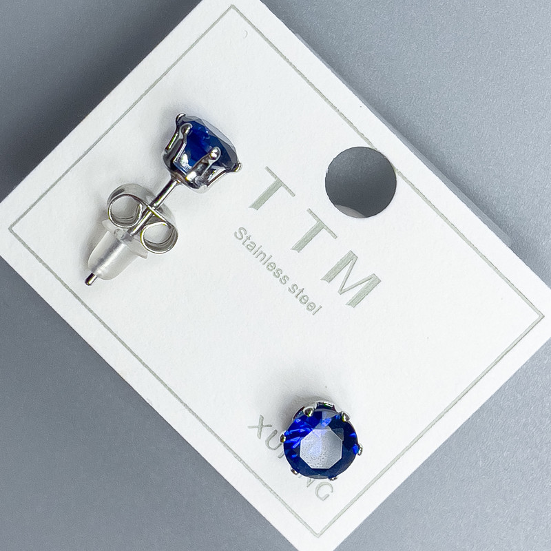 Clous d'oreilles Xuping avec pierre bleue 6 mm +- rhodié