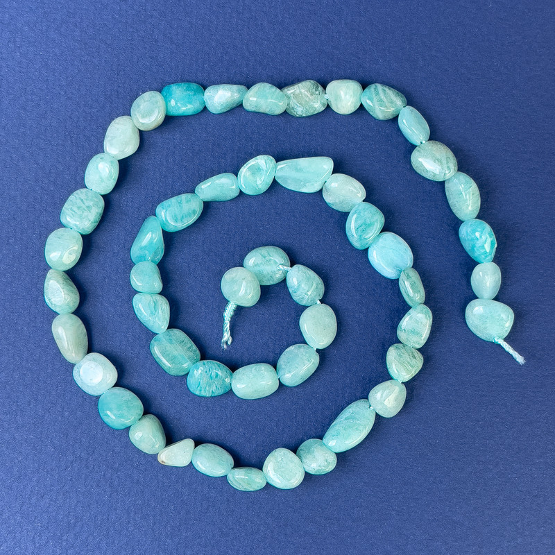 Perles d'amazonite roulées 8x6 mm +/- sur fil, longueur 39 cm+