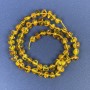 Perles d'ambre taillées 6×4 mm sur fil