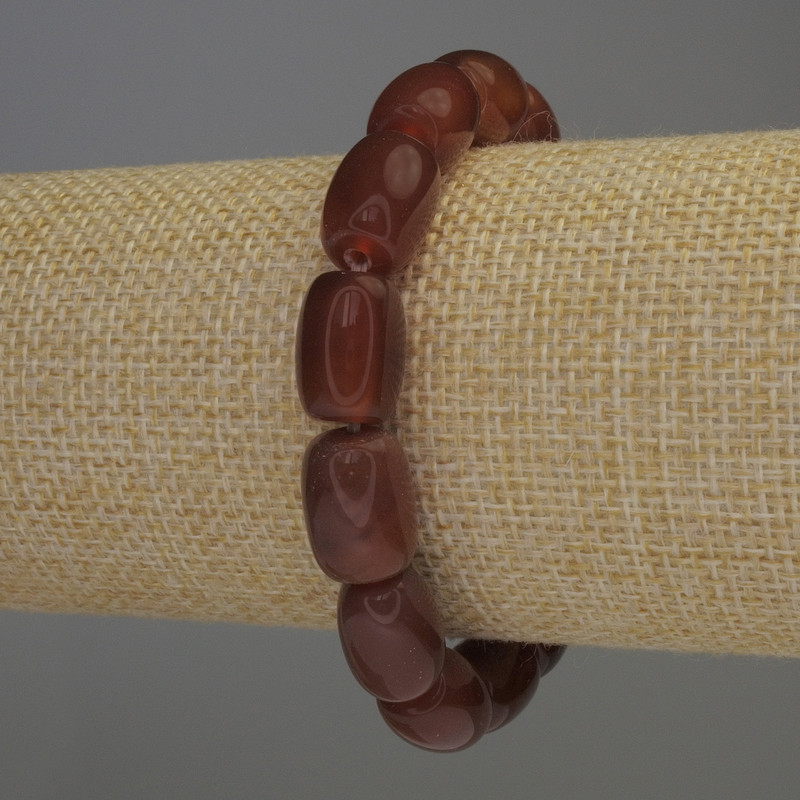 Bracelet en cornaline barillet, diamètre 13 × 9 mm ±, longueur 18 cm, élastique