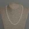 Collier en topaze et cristal de roche, perles facettées de 6 mm de diamètre, longueur environ 45 cm, avec fermoir