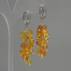 Boucles d'oreilles en ambre facetté 6x6 mm ±, épaisseur 14 mm ±, longueur 55 mm ±