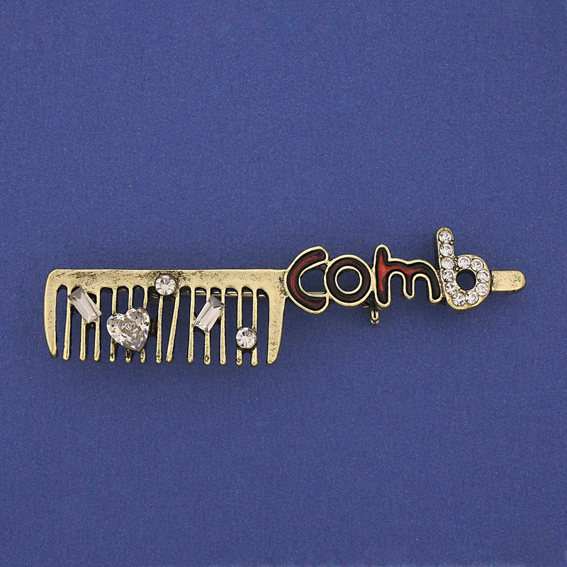 Broche en forme de peigne, strass blancs, métal doré, 60×12 mm+