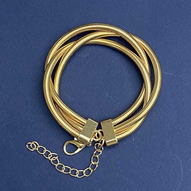 Bracelet triple en métal doré avec chaîne d'extension