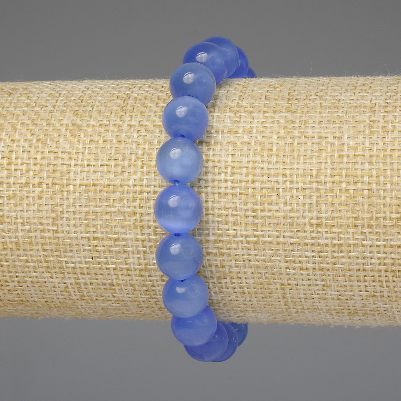 Bracelet œil de chat bleu, billes lisses 10 mm ±, longueur 18 cm ±, élastique