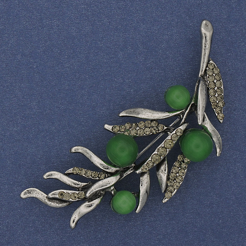Broche Branche verte Œil de chat vert, strass gris, 67 × 26 mm, métal argenté
