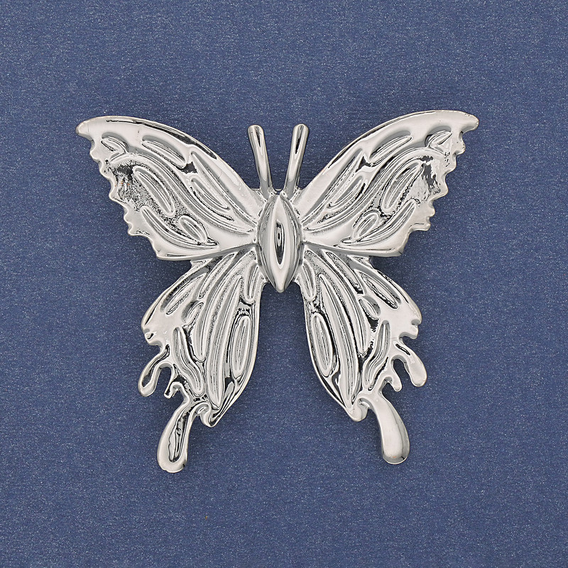 Broche Papillon métal argenté 45×42 mm+
