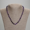 Collier en sugélite, grains facettés, diamètre 8×6 mm ±, perles de rocaille 3 mm ±, longueur 45 cm ±, avec fermoir
