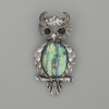 Broche-pendentif « Hibou » avec haliotis 60×29 mm ±, strass noirs, métal argenté