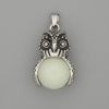 Pendentif Hibou en onyx, métal argenté, diamètre 30 × 20 mm ±, longueur 37 mm ±