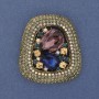 Broche-pendentif «Accent», cristaux et strass, métal doré, 45×30–40 mm+