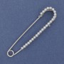 Broche-épingle avec perles blanches 70 × 16 mm ± métal argenté