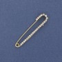 Broche-épingle avec strass blancs 56 × 11 mm ± métal doré