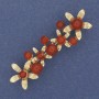 Broche «Fleurs» en cornaline sur métal doré, 55 × 17 mm+