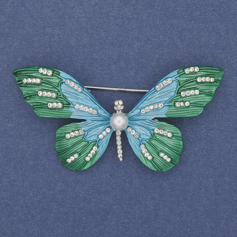 Broche Papillon strass blancs émail métal argenté 60×35 mm +