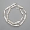 Perles baroques, teinte « essence », sur fil 40 cm, 20-26×6, 5-7, 5 mm +-