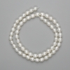Perles naturelles d’eau douce 6–7 × 5–5,5 mm, longueur environ 37 cm sur fil