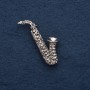 Broche «Saxophone» 5 × 2 cm, en métal gris