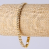Bracelet strassé à deux rangs, couleur dorée, longueur 19 cm, largeur 5 mm