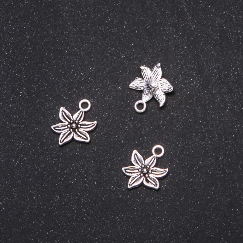 Fournitures - Pendentif Fleur 13×16 mm, conditionnement 20 g ± 25 pièces