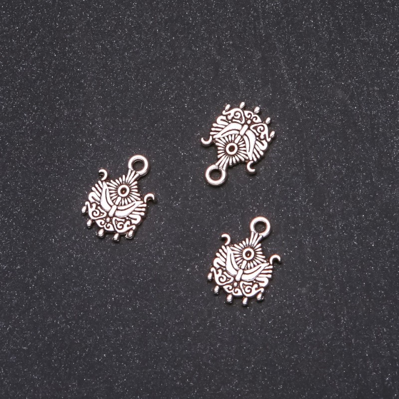 Fournitures - pendentif 12x17 mm, conditionnement 20 g ± 17 pièces