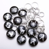 Porte-clé Zodiaque, diamètre 3,5 cm, longueur 9 cm, emballage de 12 pièces