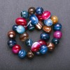 Perles d'agate multicolores sur fil 17×12 mm, longueur 38 cm, trou traversant