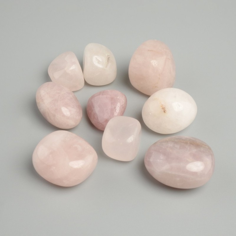 Quartz rose facetté, diamètre 20 mm (+-), conditionnement 100 g (+-)