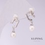Boucles d'oreilles Xuping «Notes» avec des perles blanches de Majorque