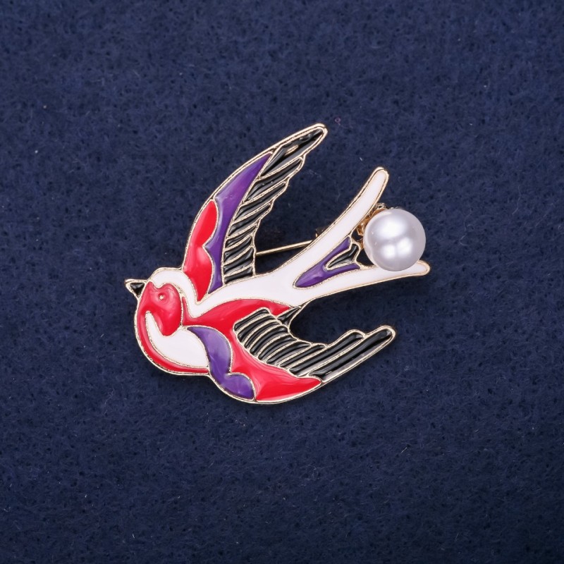 Broche Hirondelle émaillée couleur dorée