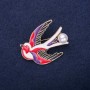 Broche Hirondelle émaillée couleur dorée