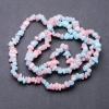 Perles en quartz teinté rose-bleu, facettes fines, diamètre 6–8 mm, fil d'environ 85 cm