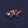 Broche «Nœud papillon» en cristaux, métal argenté 17 × 30 mm