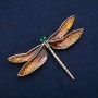 Broche libellule émail orange, métal argenté 47 × 76 mm