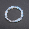 Bracelet pierre lunaire (opalite) taillée sur élastique, diamètre 8–10 mm, longueur 18 cm