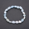 Bracelet en pierre naturelle d'aigue-marine, perles galetées sur élastique, perles de 7 × 10 mm (±), tour de poignet 18 cm