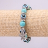 Bracelet-amulette en turquoise avec des yeux bleus sur élastique, diamètre 10(±) mm, longueur 18 cm, avec inserts et pendentif en forme d'étoile de mer