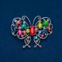 Broche Papillon métal argenté, strass multicolores 48×60 mm +