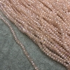 Perles tchèques de cristal sur fil, rose pâle transparent, rondelles facettées à effet benzine, diamètre environ 3 x 2,5 mm, longueur 36 cm ±