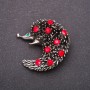 Broche à strass rouges, métal jaune, 42×42 mm