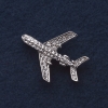 Broche « Avion » 3×3 cm strass, métal gris