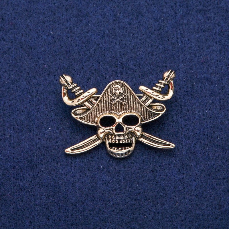 Broche pirate dorée 29×39 mm